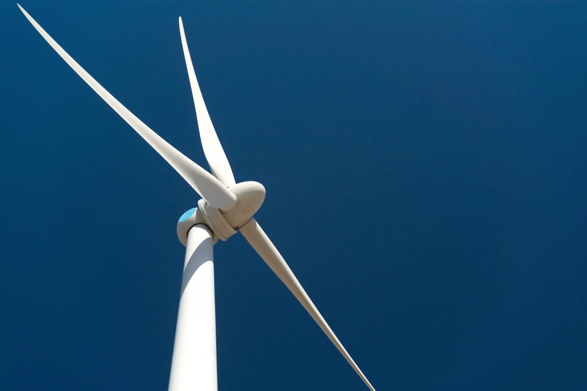 wind-turbine-against-deep-blue-sky-min